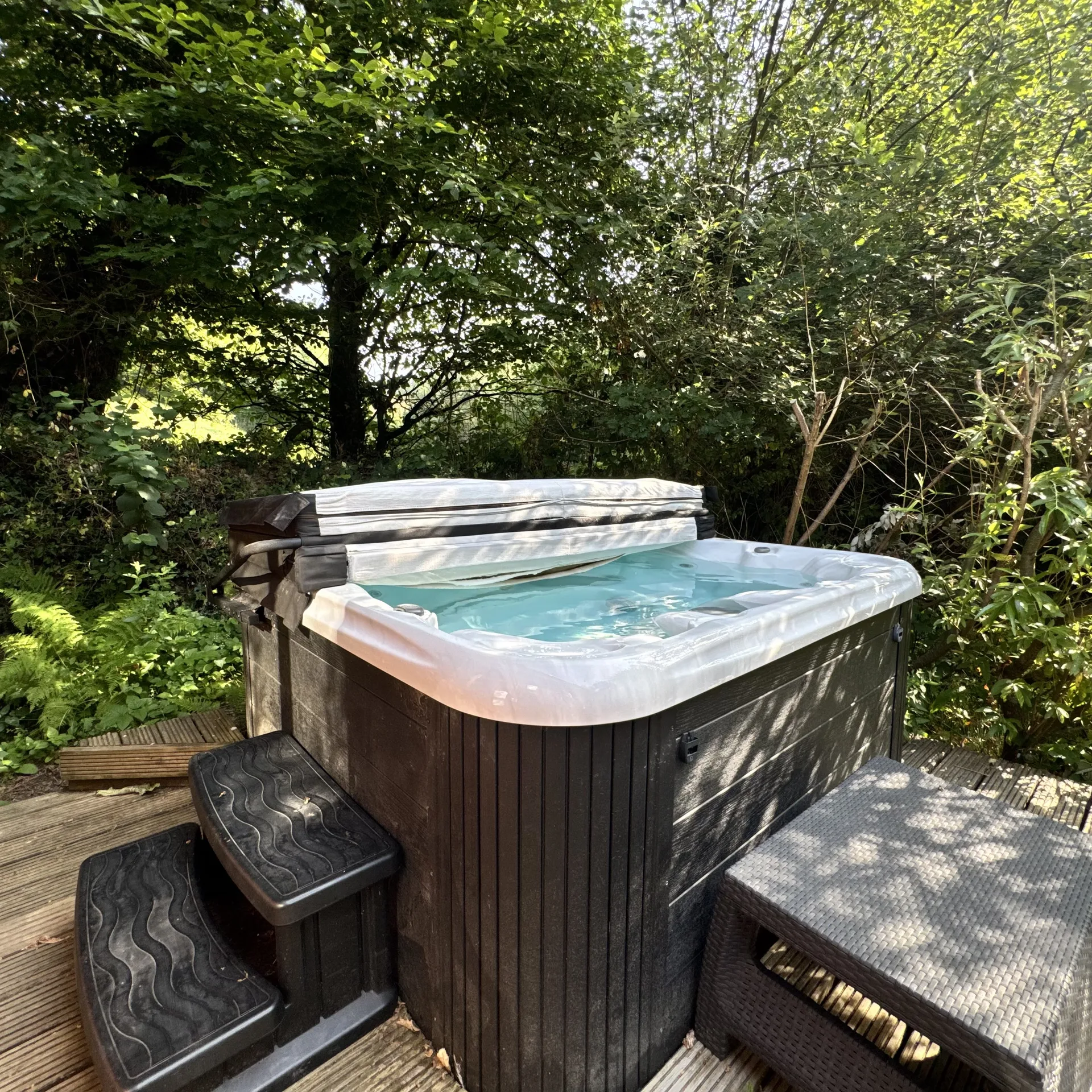 The private hot tub on Stamford’s deck, tucked among the trees