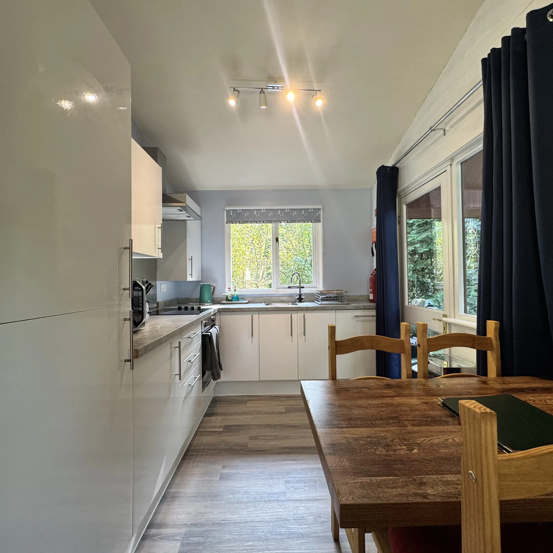 The kitchen and dining table at Stamford, set for a meal