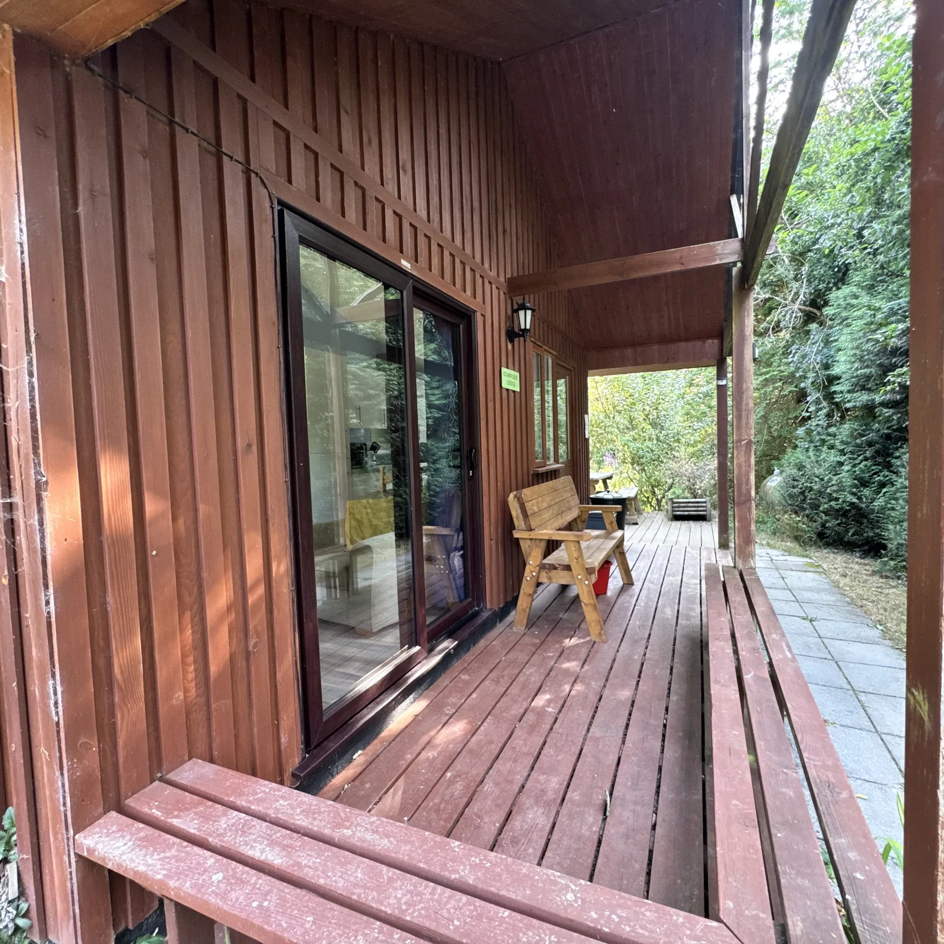 The timber porch and deck along the side of Stamford lodge