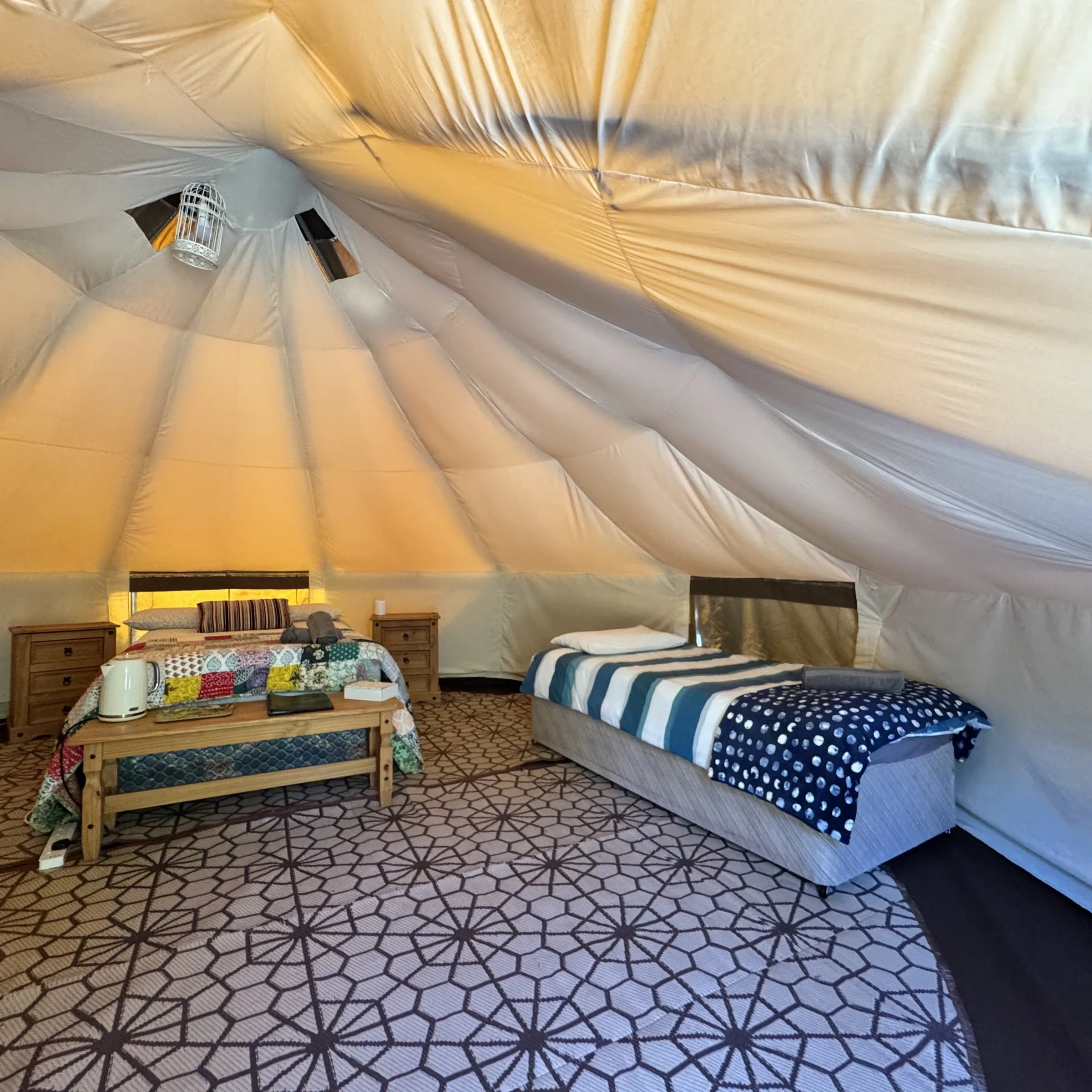 A second view inside St Petroc, with the double bed and single bed arrangement